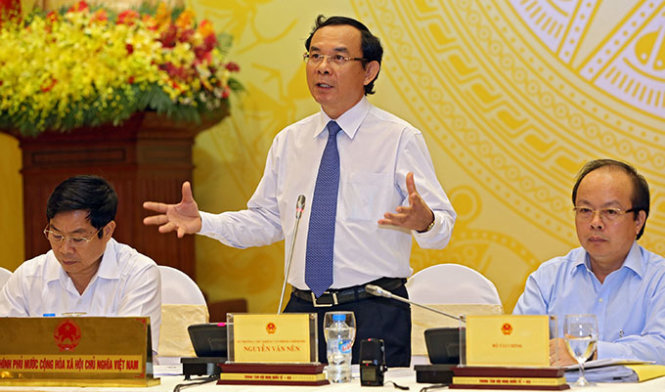 Chủ nhiệm Văn phòng Chính phủ Nguyễn Văn Nên trả lời báo chí trong cuộc họp báo - Ảnh: Việt Dũng