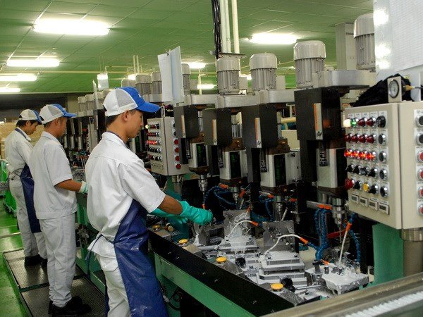 Sản xuất linh kiện ôtô xe máy tại công ty TNHH Keihin Việt Nam - Ảnh: TTXVN