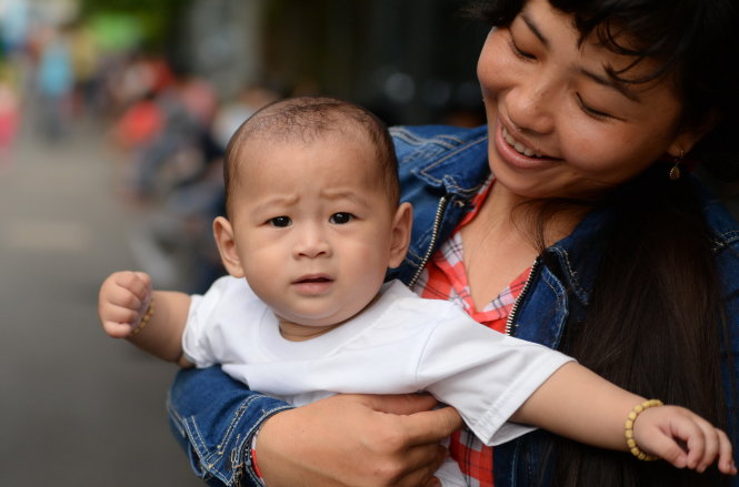 Bé Nguyễn Quốc Huy sau năm tháng rời Bệnh viện Nhi Đồng 1, tháng 4-2015 - Ảnh: Hữu Khoa