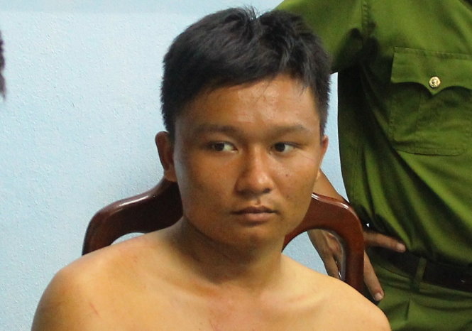 Nguyễn Văn Nghĩa bị bắt tại Công an huyện Phú Lộc vào tối 7-8-2015 - Ảnh: Nguyên Linh