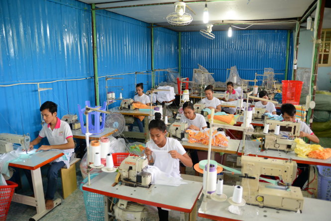Nhiều doanh nghiệp và chuyên gia đề nghị phải có cơ chế riêng để hỗ trợ doanh nghiệp vừa và nhỏ tiếp cận được vốn vay - Ảnh: T.V.N.