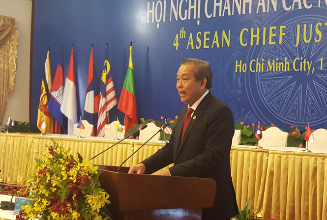 Ông Trương Hòa Bình đọc tuyên bố chung tại hội nghị - Ảnh: Hoàng Điệp