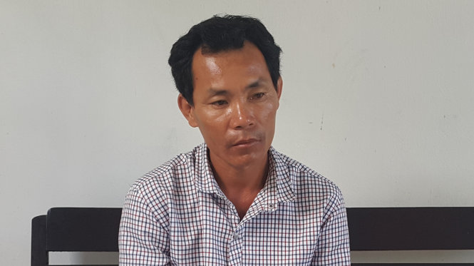 Nguyễn Văn Qui tại cơ quan công an - Ảnh: Huy Phách