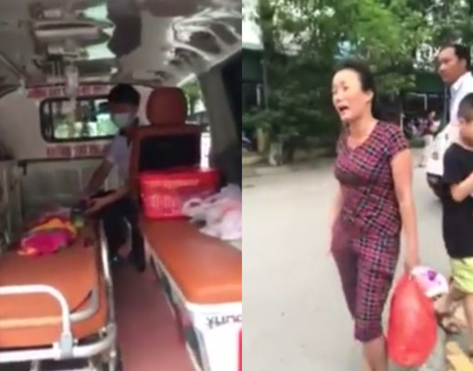 Hình ảnh thương tâm trong clip: bệnh nhi đang hấp hối trên xe cứu thương và người mẹ kêu khóc thảm thiết, trong khi bảo vệ Bệnh viện Nhi trung ương, Hà Nội nhất quyết không cho xe cấp cứu ra khỏi cổng đưa cháu bé về quê - Ảnh cắt từ clip