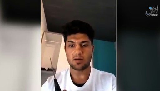 Thiếu niên xuất hiện trong video đăng tải bởi hãng tin Amaq - Ảnh: AFP