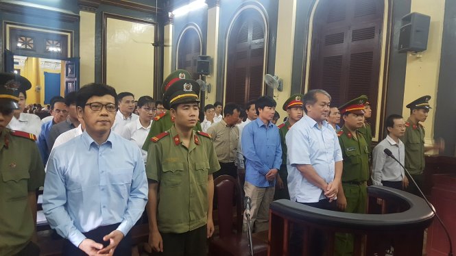 Các bị cáo tại tòa sáng 22-7 - Ảnh: Hoàng Điệp