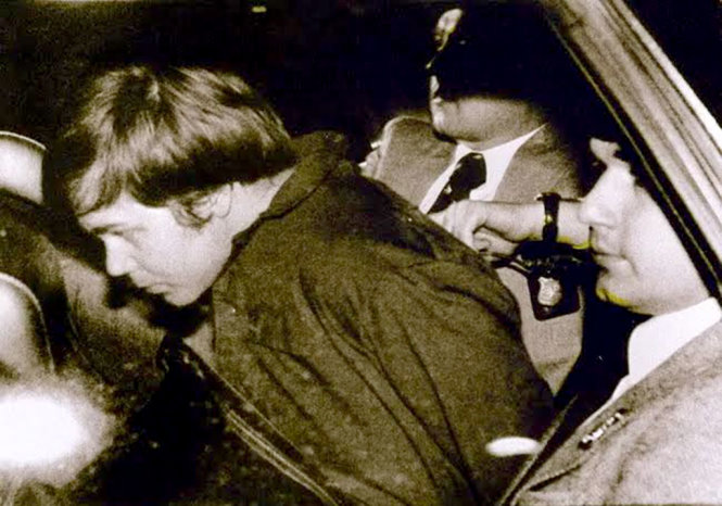 John Hinckley Jr bị cảnh sát bắt giữ ngay sau khi nổ súng vào Tổng thống và không có ý định chạy trốn - Ảnh: AFP