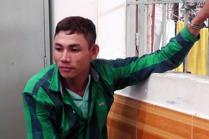 Đối tượng Nguyễn Văn Trọng tại trụ sở công an - Ảnh: A.L