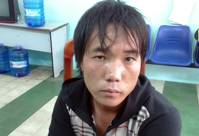Đối tượng Trần Anh Tuấn bị bắt tại cơ quan công an - Ảnh: QUỲNH ANH