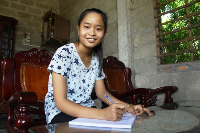 Cô tân sinh viên Huỳnh Thị Kim Trinh - Ảnh: N.LINH