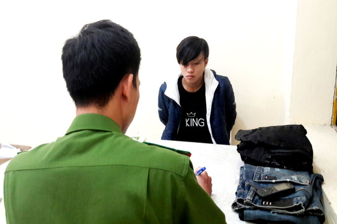 Anh Dũng tại cơ quan công an - Ảnh: THANH TUẤN