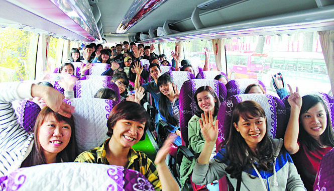 Nụ cười rạng rỡ của các bạn sinh viên trên “Chuyến xe mùa xuân - Tết sum vầy” 2016 về sum họp cùng gia đình ngày cuối năm - Ảnh: Q.L.
