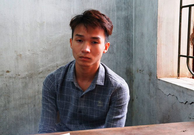 Nghi phạm Trần Tiến Dũng bị tạm giữ tại cơ quan điều tra - Ảnh: THẮNG DINH
