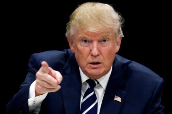 Ông Trump chỉ trích phe Dân Chủ tìm cách hạ thấp chiến thắng của ông khi cáo buộc Nga giúp ông lên làm tổng thống - Ảnh: Reuters