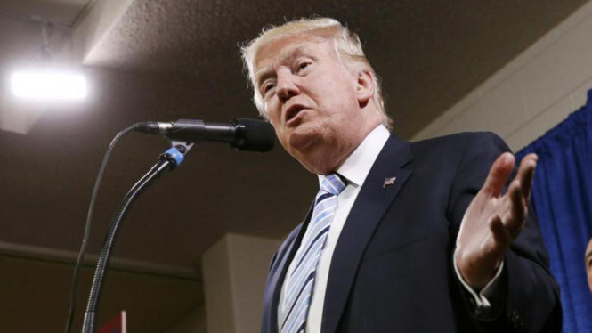 Ông Donald Trump tiếp bà Theresa May chỉ 7 ngày sau khi tuyên thệ nhậm chức - Ảnh: Reuters