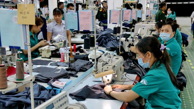 Sản xuất dệt may xuất khẩu tại một công ty ở TP.HCM - Ảnh: Ngọc Hiển