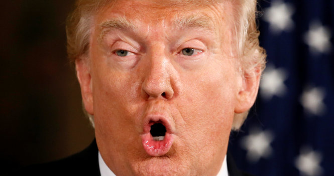 Ông Trump phát biểu trong cuộc họp báo chung với thủ tướng Đức Angela Merkel tại Washington ngày 17-3 - Ảnh: Reuters