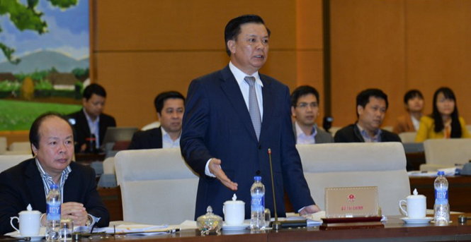 Bộ trưởng Bộ Tài chính Đinh Tiến Dũng nói rằng làm ra thì ít mà chi tiêu lại nhiều, nợ công không tăng nhanh mới lạ - Ảnh: Cổng TTQH