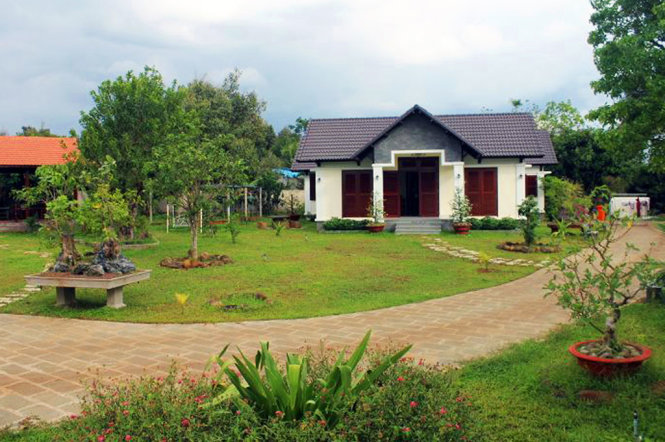 Căn nhà xây kiên cố trong khu đất từng được ông Nguyễn Văn Đấu đứng tên - Ảnh: A LỘC