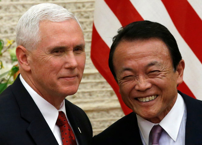 Phó tổng thống Mỹ Mike Pence và phó thủ tướng Nhật Taro Aso tại Tokyo ngày 18-4 - Ảnh: Reuters