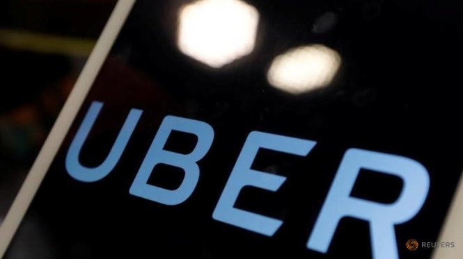 Logo hãng Uber trên iPad - Ảnh: Reuters