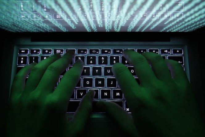 Một người đàn ông Nigeria bị buộc tội tham gia đường dây gian lận email toàn cầu - Ảnh: Reuters