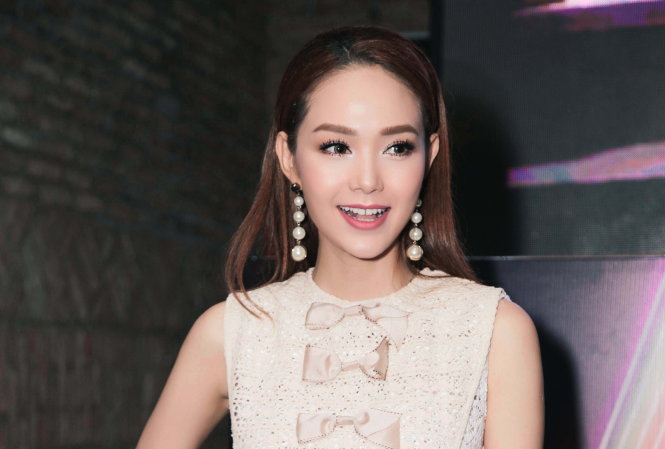 Ca sĩ Minh Hằng xinh tươi trong buổi ra mắt MV - Ảnh: Anh Tài