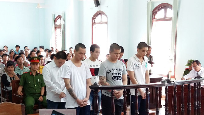 Các bị cáo tại phiên tòa sơ thẩm ngày 26-7