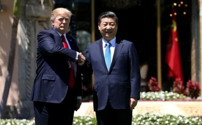 Tổng thống Mỹ Donald Trump (trái) và Chủ tịch Trung Quốc Tập Cận Bình - Ảnh: Reuters
