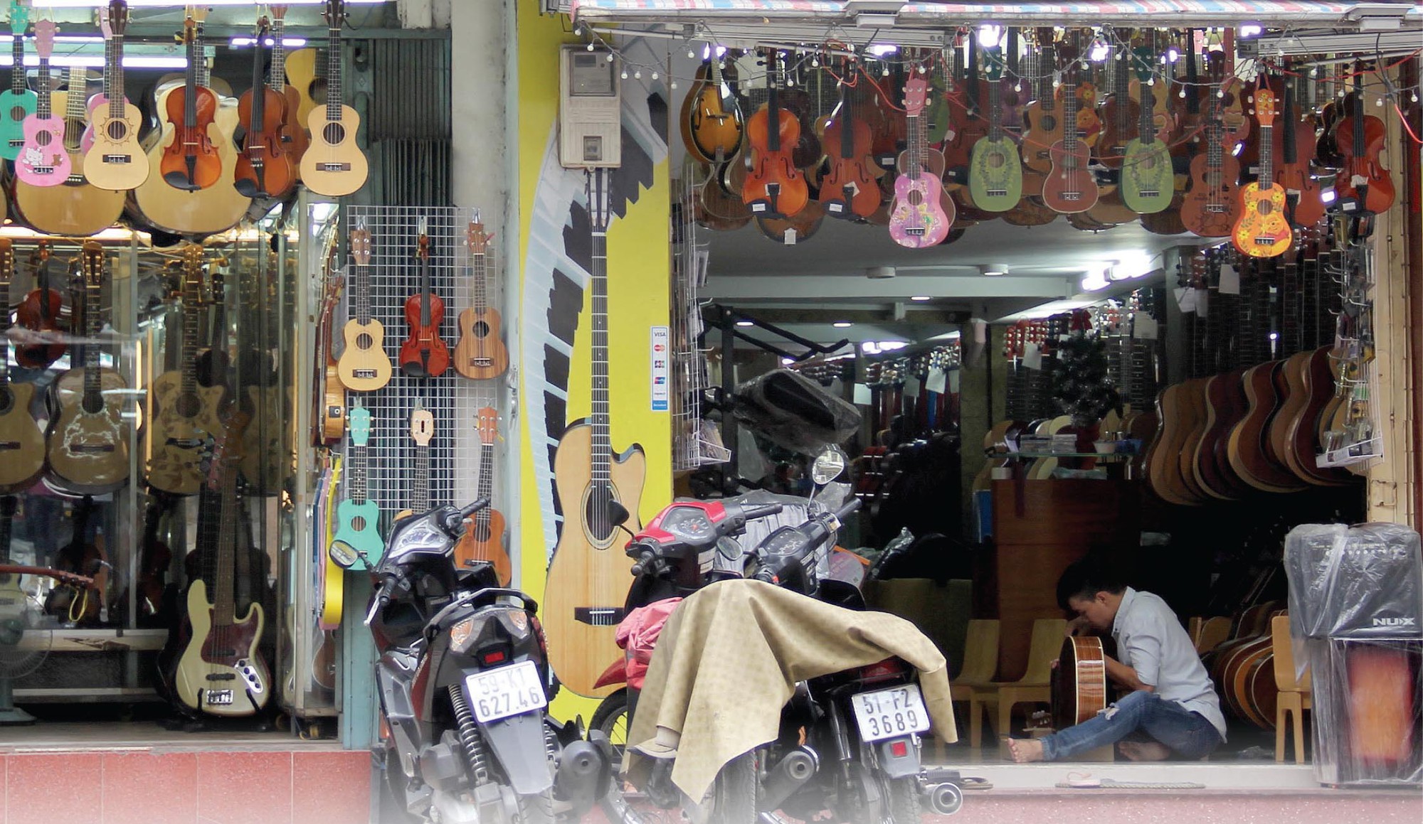 Nguyễn Thiện Thuật - Con phố thanh âm giữa lòng Sài Gòn - Ảnh 1. Nguyễn Thiện Thuật - Con phố thanh âm giữa lòng Sài Gòn - Ảnh 1.