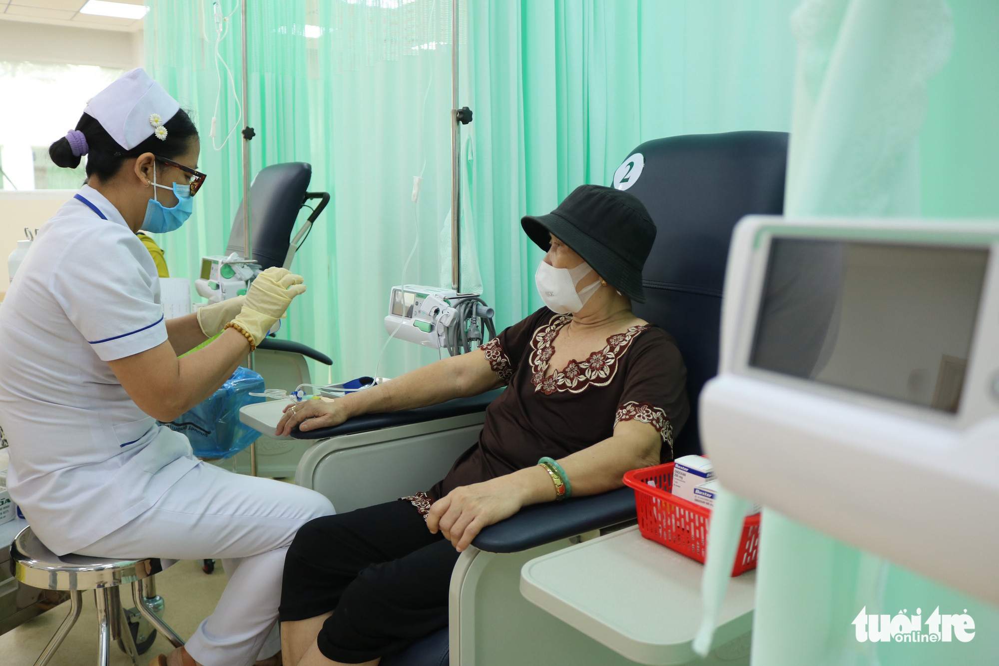 Bệnh viện Ung bướu chuyển 80% người bệnh tái khám trong ngày sang cơ sở 2 - Ảnh 6. Bệnh viện Ung bướu chuyển 80% người bệnh tái khám trong ngày sang cơ sở 2 - Ảnh 6.