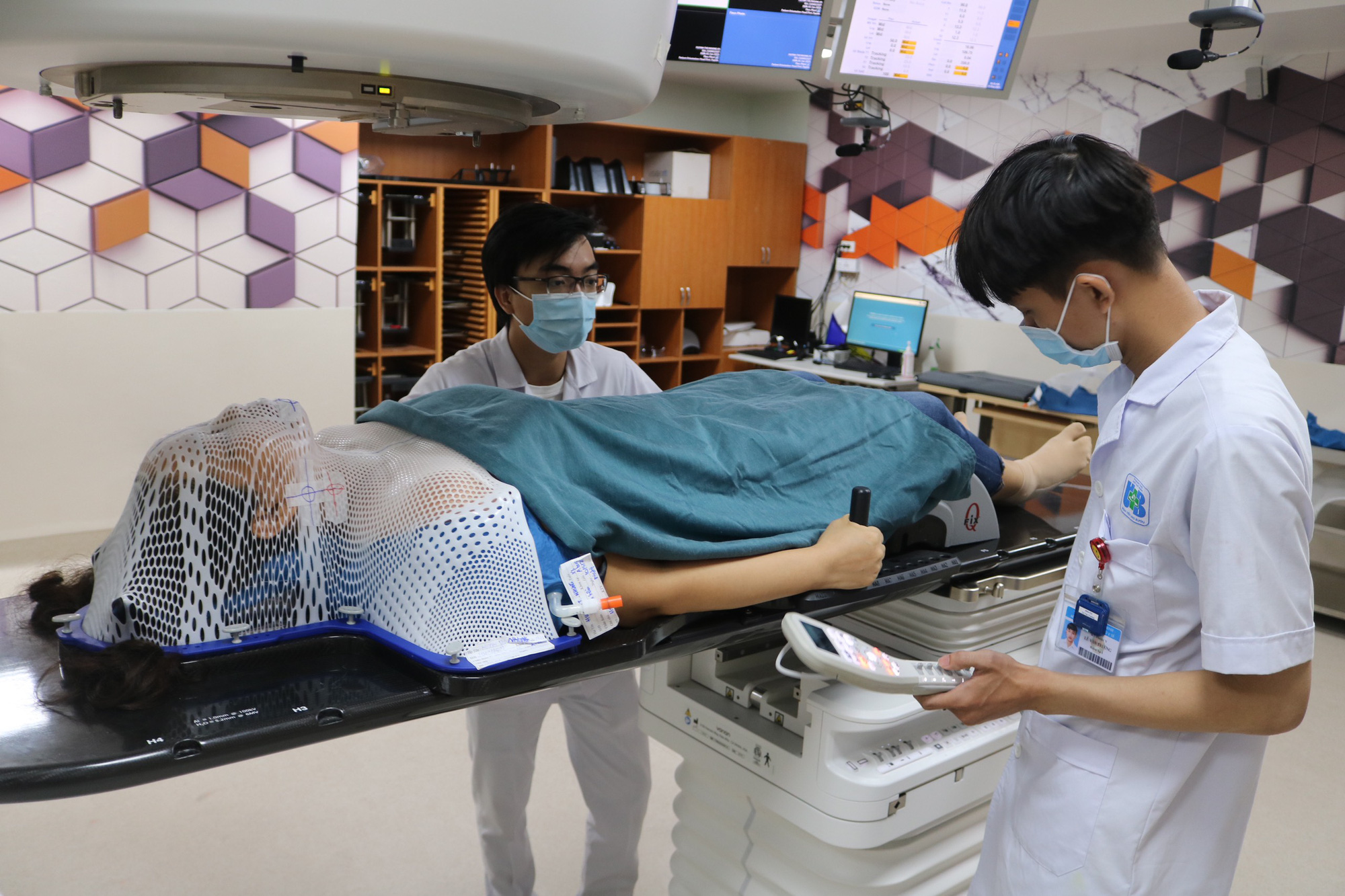 Bệnh viện Ung bướu chuyển 80% người bệnh tái khám trong ngày sang cơ sở 2 - Ảnh 1. Bệnh viện Ung bướu chuyển 80% người bệnh tái khám trong ngày sang cơ sở 2 - Ảnh 1.