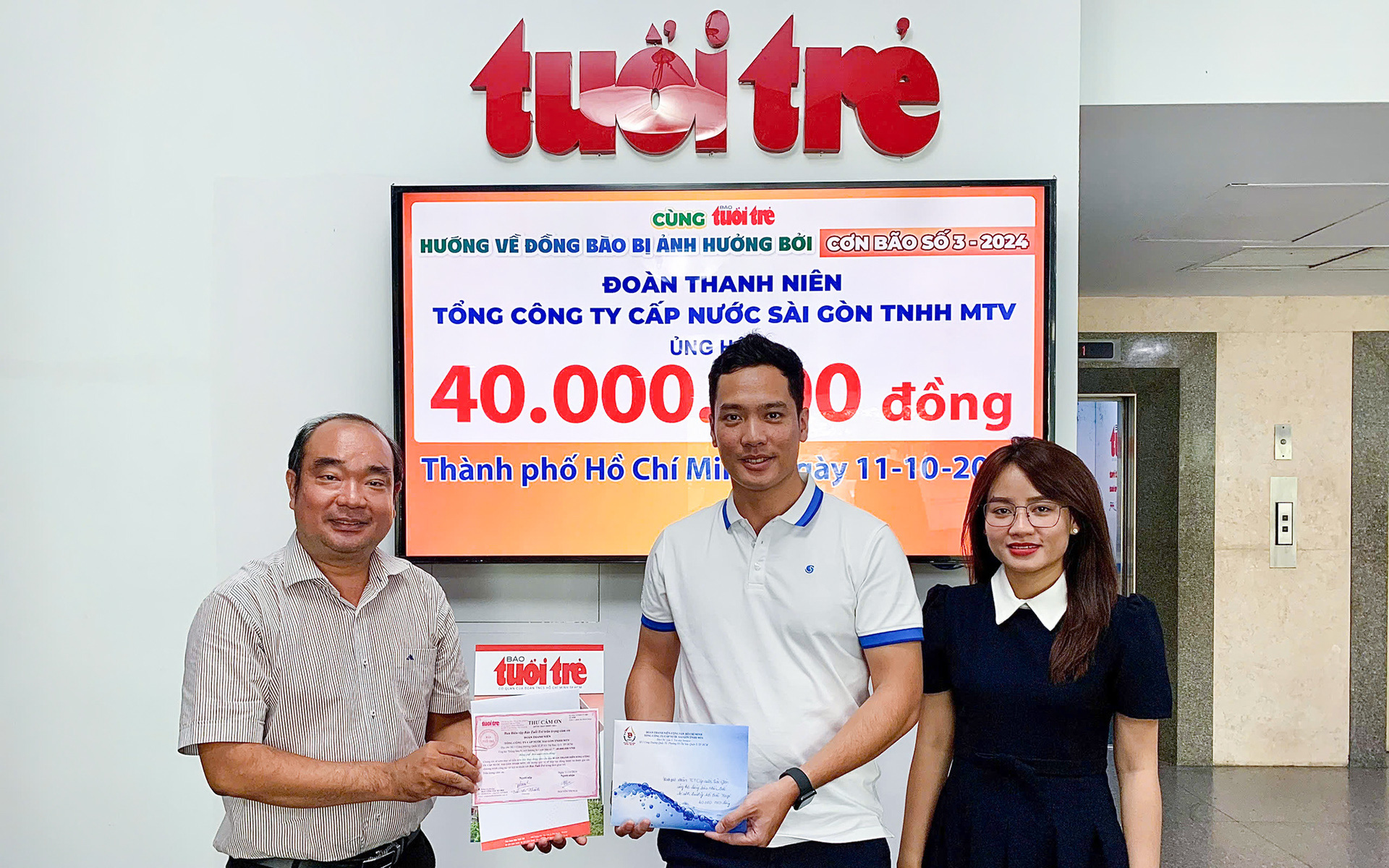 Báo Tuổi Trẻ tiếp nhận đóng góp của Đoàn thanh niên Sawaco ủng hộ đồng bào miền Bắc - Ảnh 1. Báo Tuổi Trẻ tiếp nhận đóng góp của Đoàn thanh niên Sawaco ủng hộ đồng bào miền Bắc - Ảnh 1.