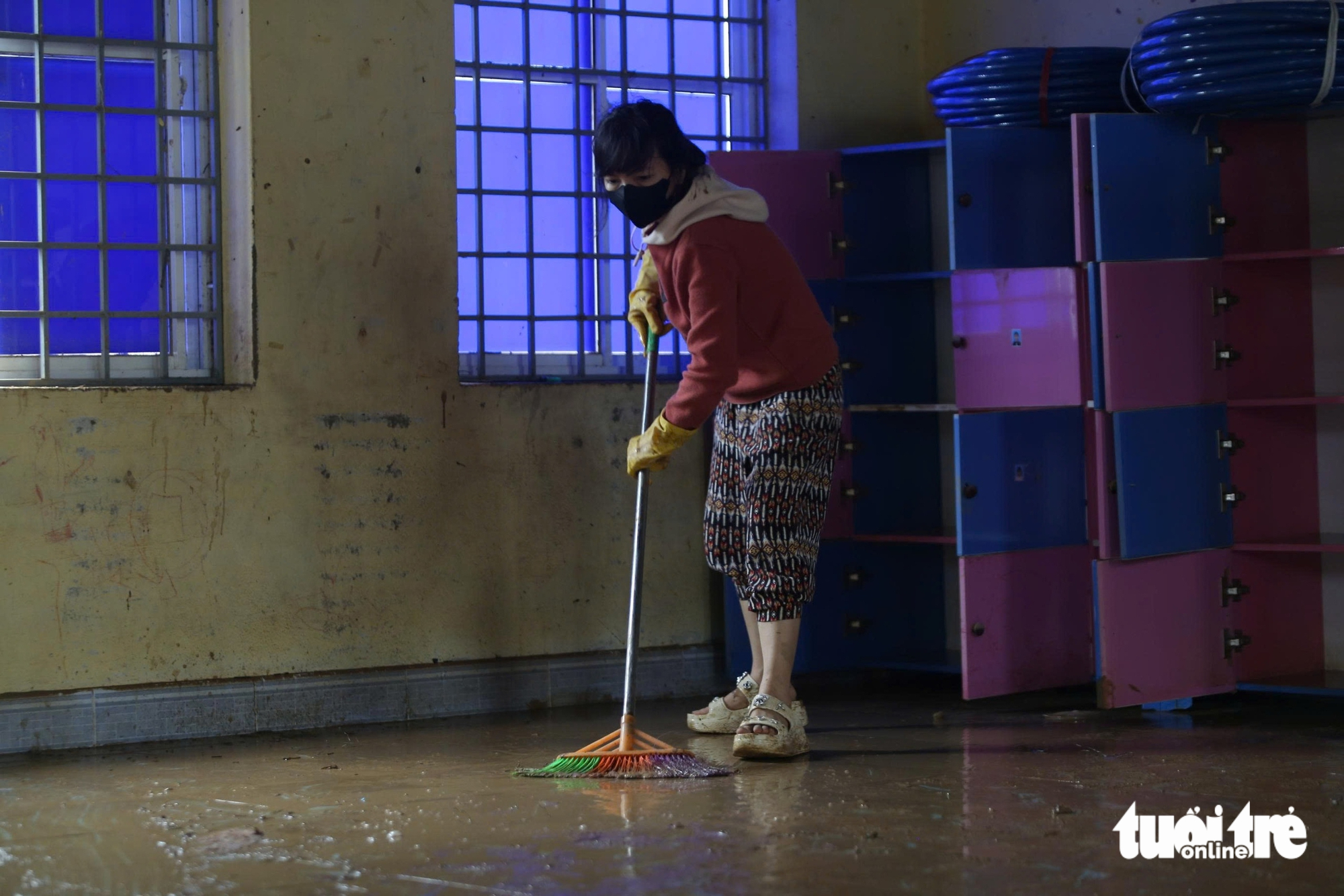 Teachers put aside their housework and waded through mud to clean the ...
