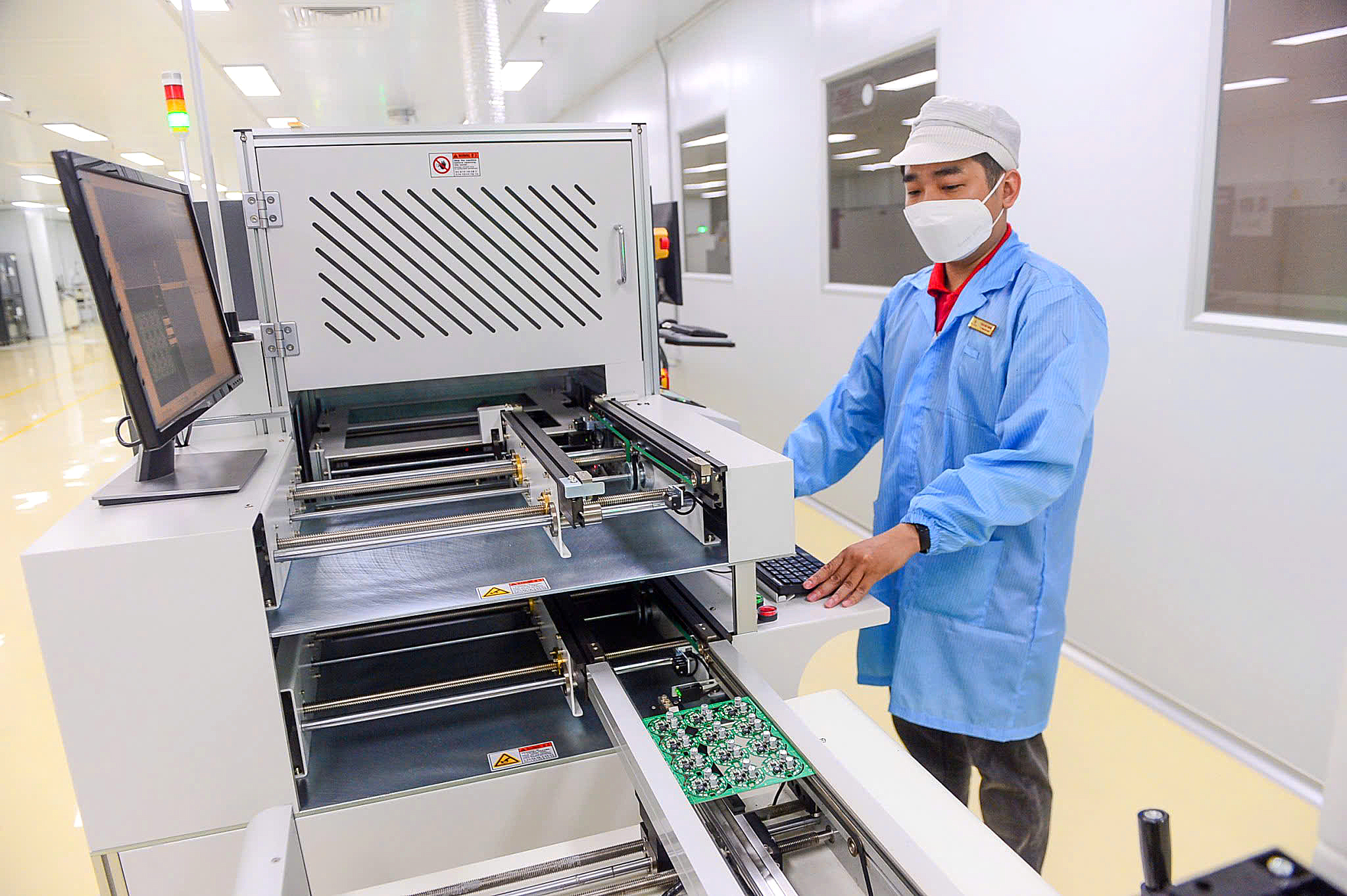 Tái cấu trúc không gian công nghiệp từ hợp nhất ba tỉnh thành để TP.HCM thay áo mới - Ảnh 1. Tái cấu trúc không gian công nghiệp từ hợp nhất ba tỉnh, thành để TP.HCM thay áo mới - Ảnh 1.