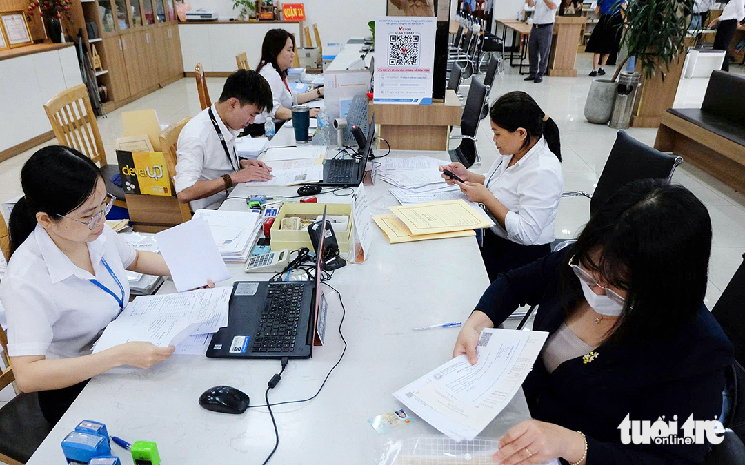 TP.HCM yêu cầu không để người dân đợi quá 20 phút khi nộp hồ sơ tại phường, xã mới - Ảnh 1. phường, xã mới - Ảnh 1.