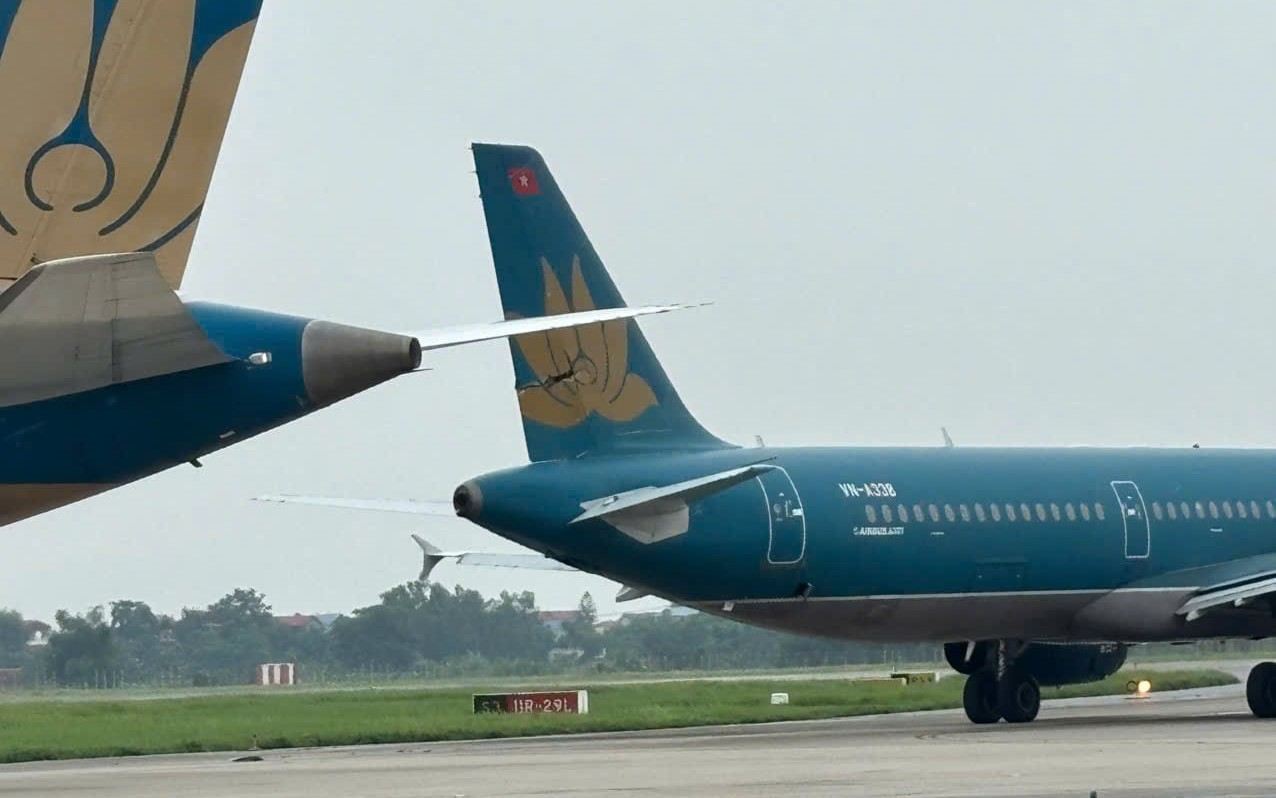 Vietnam Airlines suspends 4 pilots after taxiway collision at Hanoi airport- Ảnh 1.