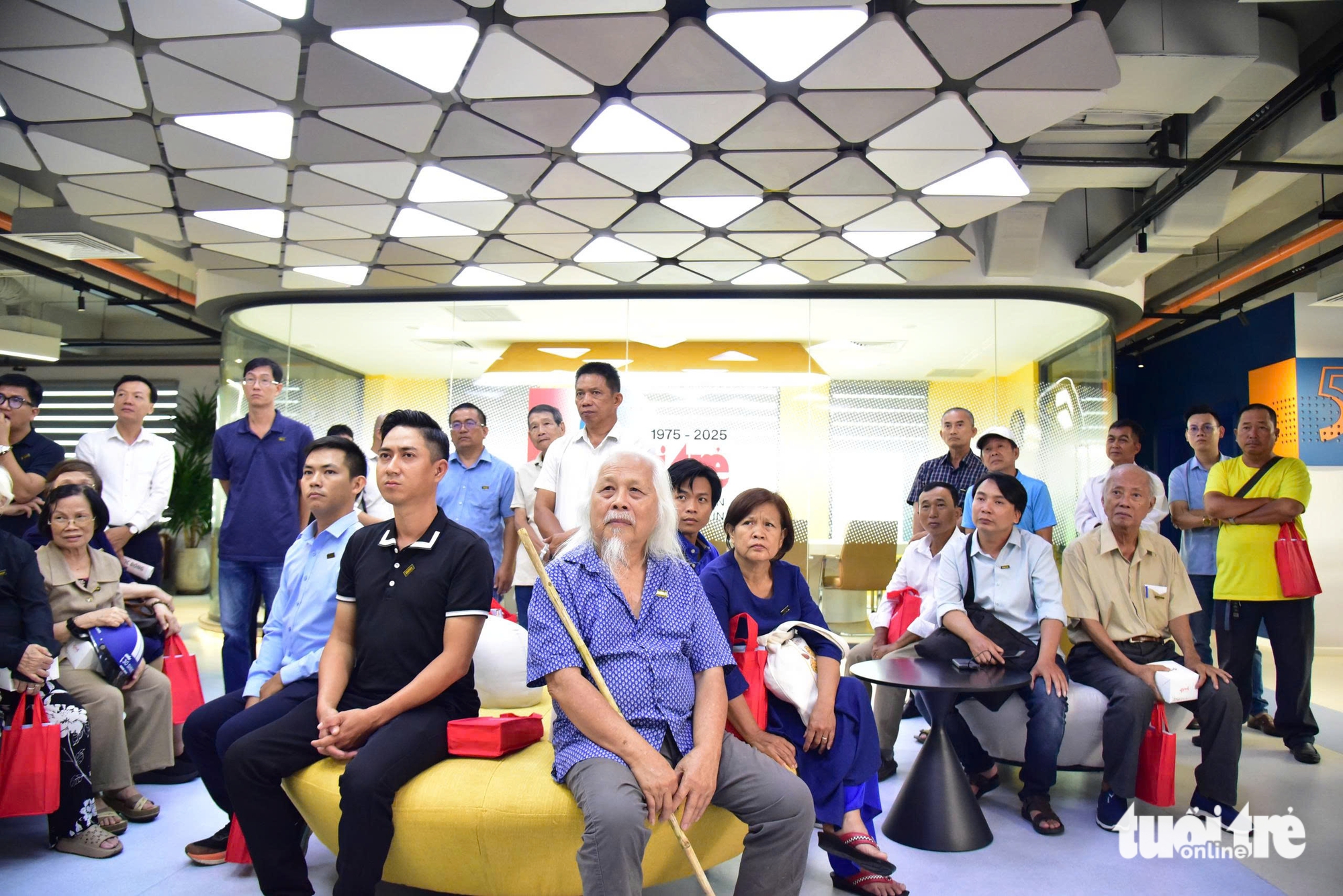 50 bạn đọc lần đầu tham quan tòa soạn báo Tuổi Trẻ - Ảnh 3.