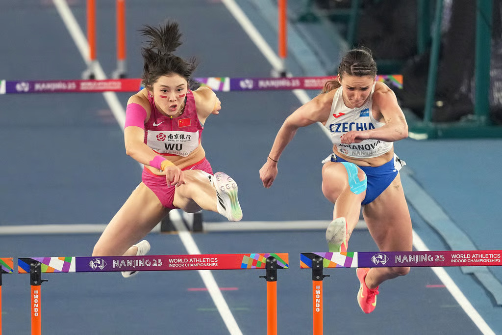 Đường chạy 100m rào quy tụ những mỹ nhân điền kinh - Ảnh 7.