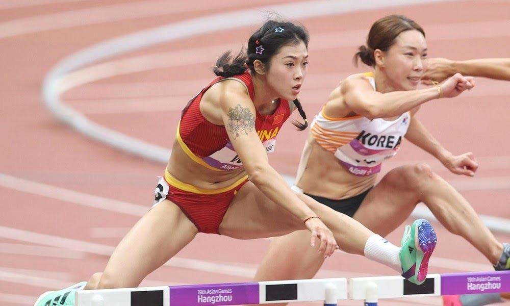 Đường chạy 100m rào quy tụ những mỹ nhân điền kinh - Ảnh 6.