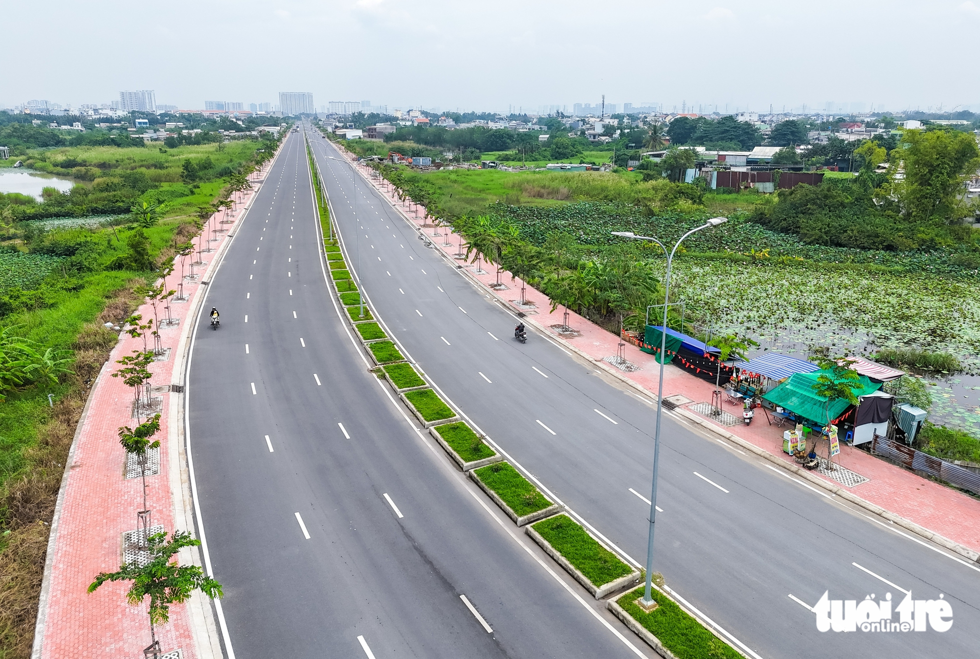 Toàn cảnh mở rộng quốc lộ 50 - TP.HCM ‘kéo gần’ Tây Ninh với con đường 6 làn xe trước nhiệm kỳ mới - Ảnh 1.