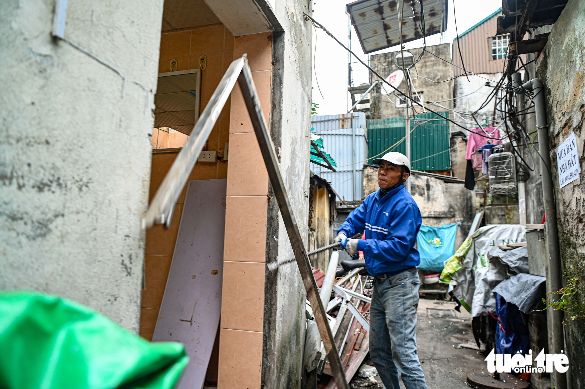Hanoi residents move out as work begins on public square east of Hoan Kiem Lake- Ảnh 7.