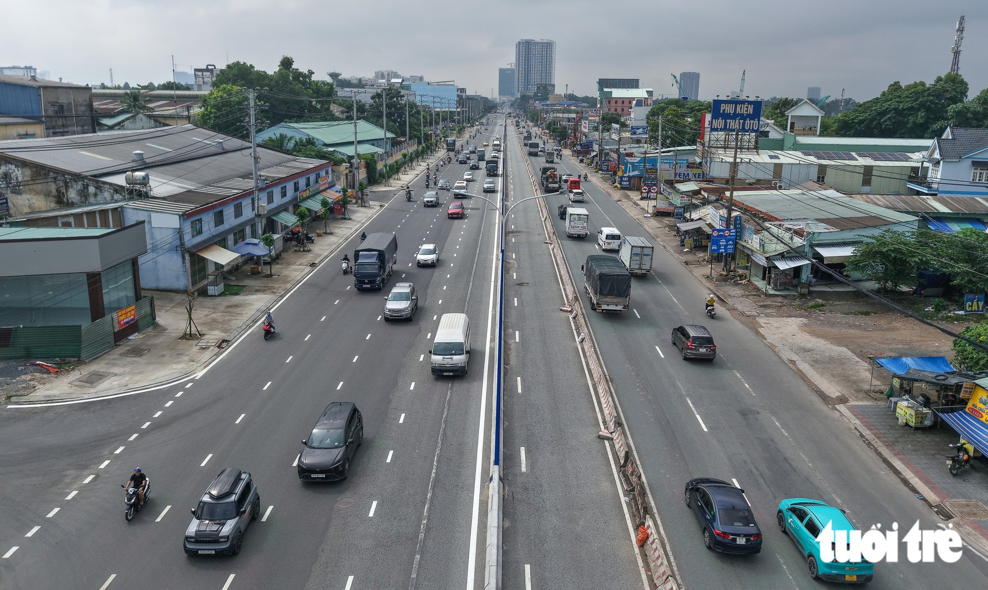 Cận cảnh diện mạo mới nhất của Quốc lộ 13 qua Bình Dương cũ sau hơn 4 năm mở rộng - Ảnh 1.