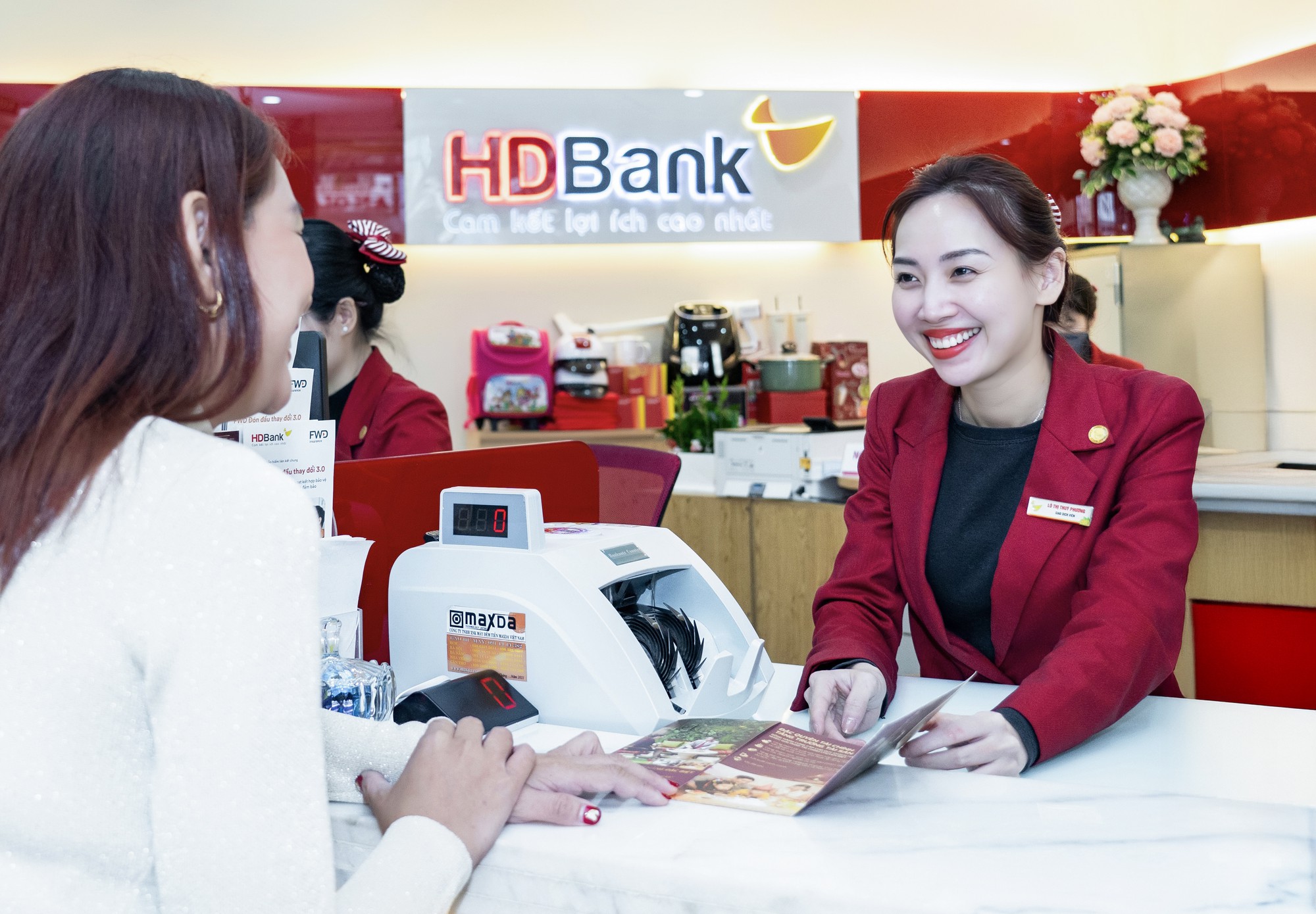 HDBank triển khai gói tín dụng 10.000 tỉ đồng, giảm lãi suất 1,5%/năm hỗ trợ doanh nghiệp - Ảnh 1.