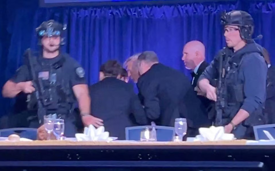 Suspect in shooting at Trump press dinner to appear in court- Ảnh 1.