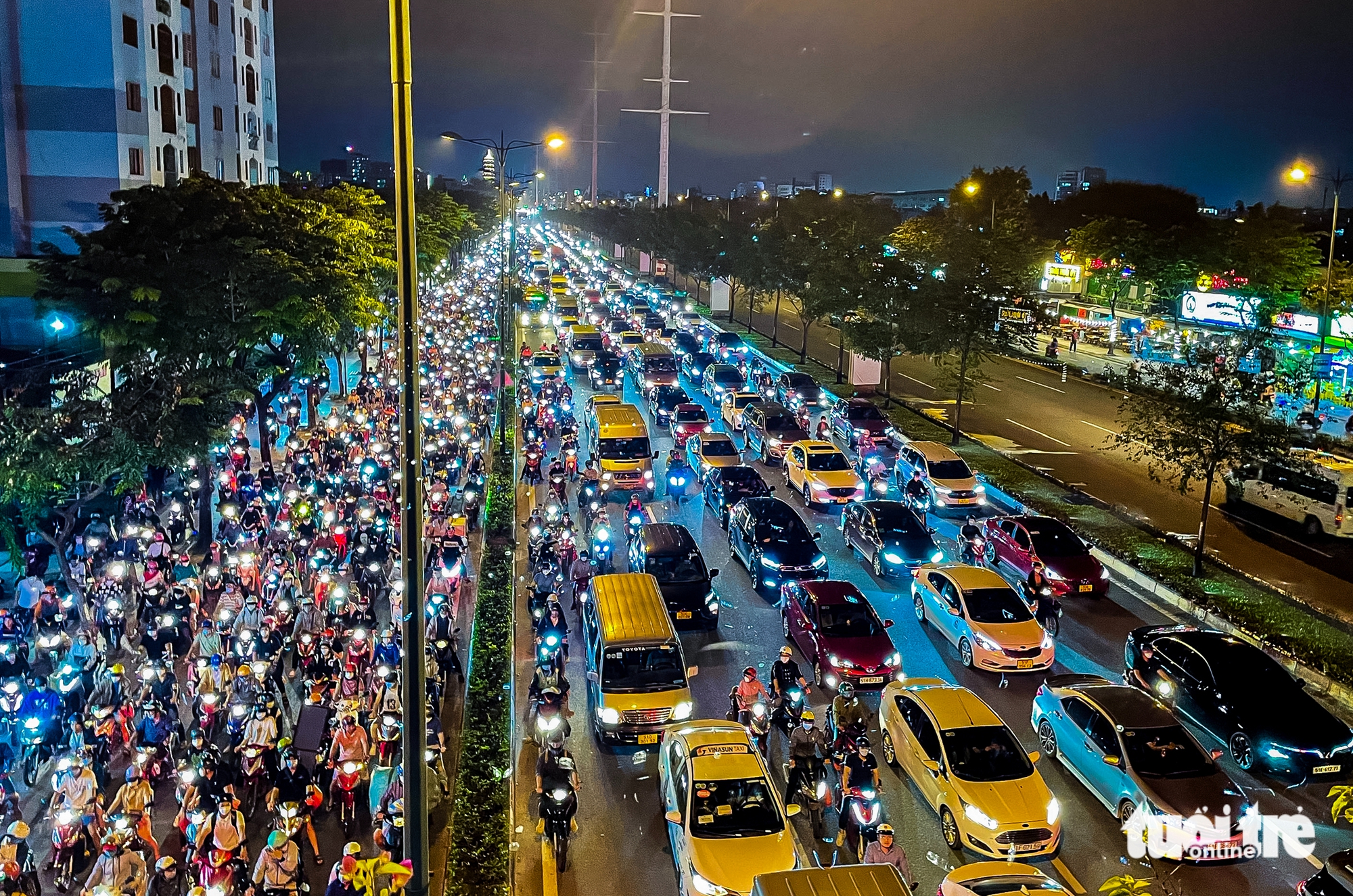 Đại lộ Phạm Văn Đồng TP.HCM 12 làn xe, một biểu tượng phát triển đô thị - Ảnh 10.