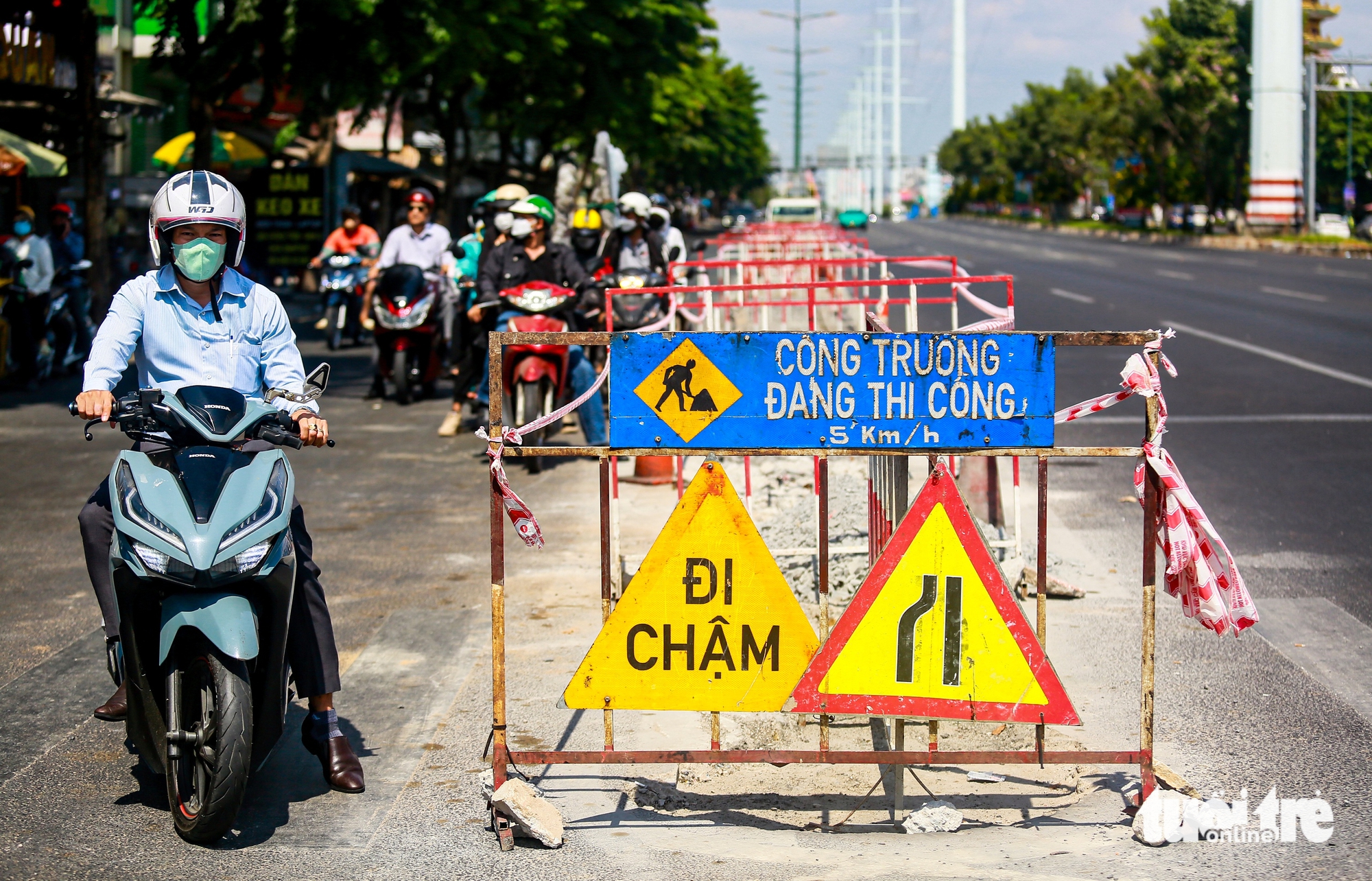 Đại lộ Phạm Văn Đồng TP.HCM 12 làn xe, một biểu tượng phát triển đô thị - Ảnh 11.