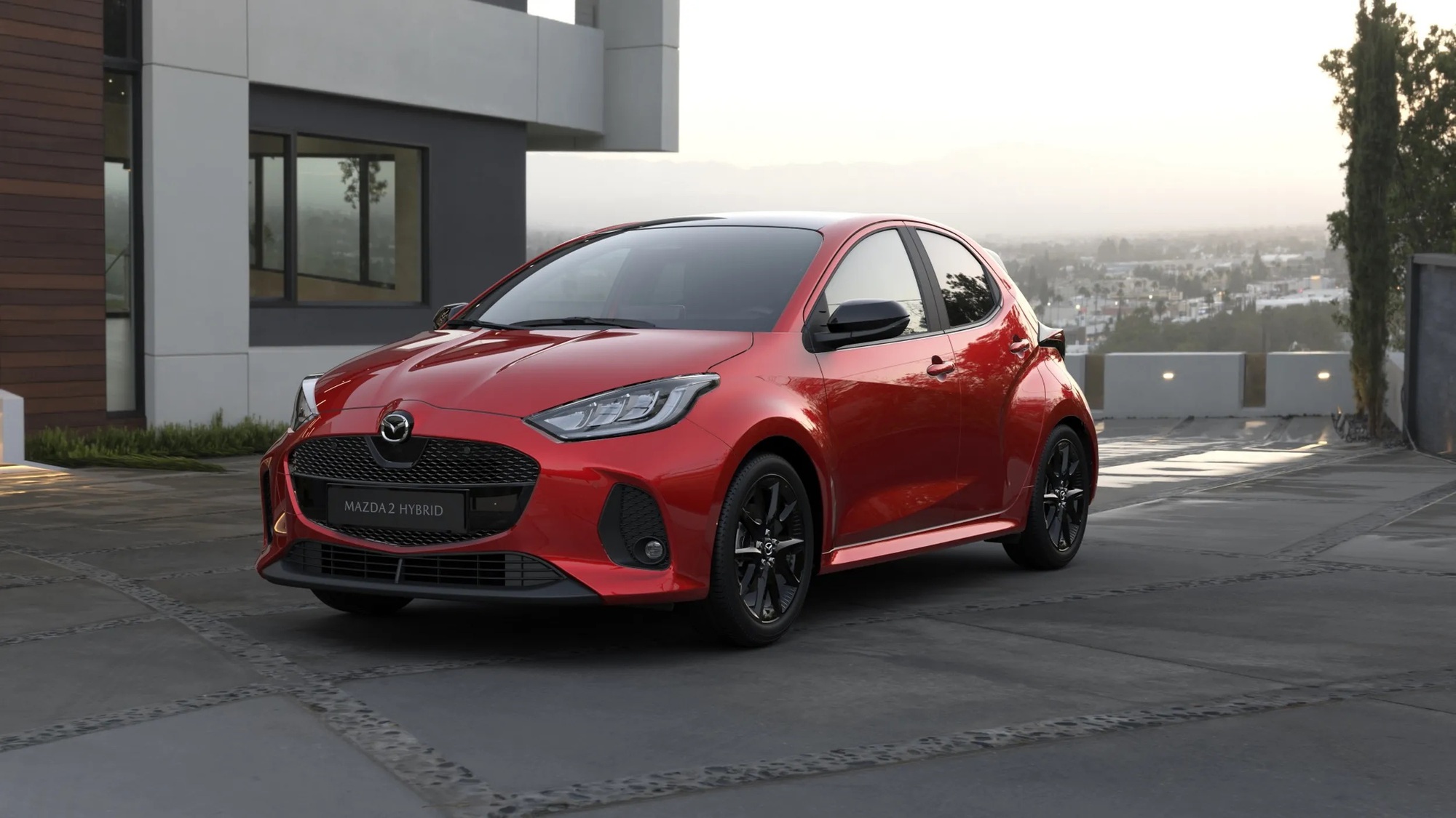 Mazda2 2026 ra mắt: Bổ sung tiện nghi, ADAS, động cơ hybrid mượn từ Toyota - Ảnh 1.