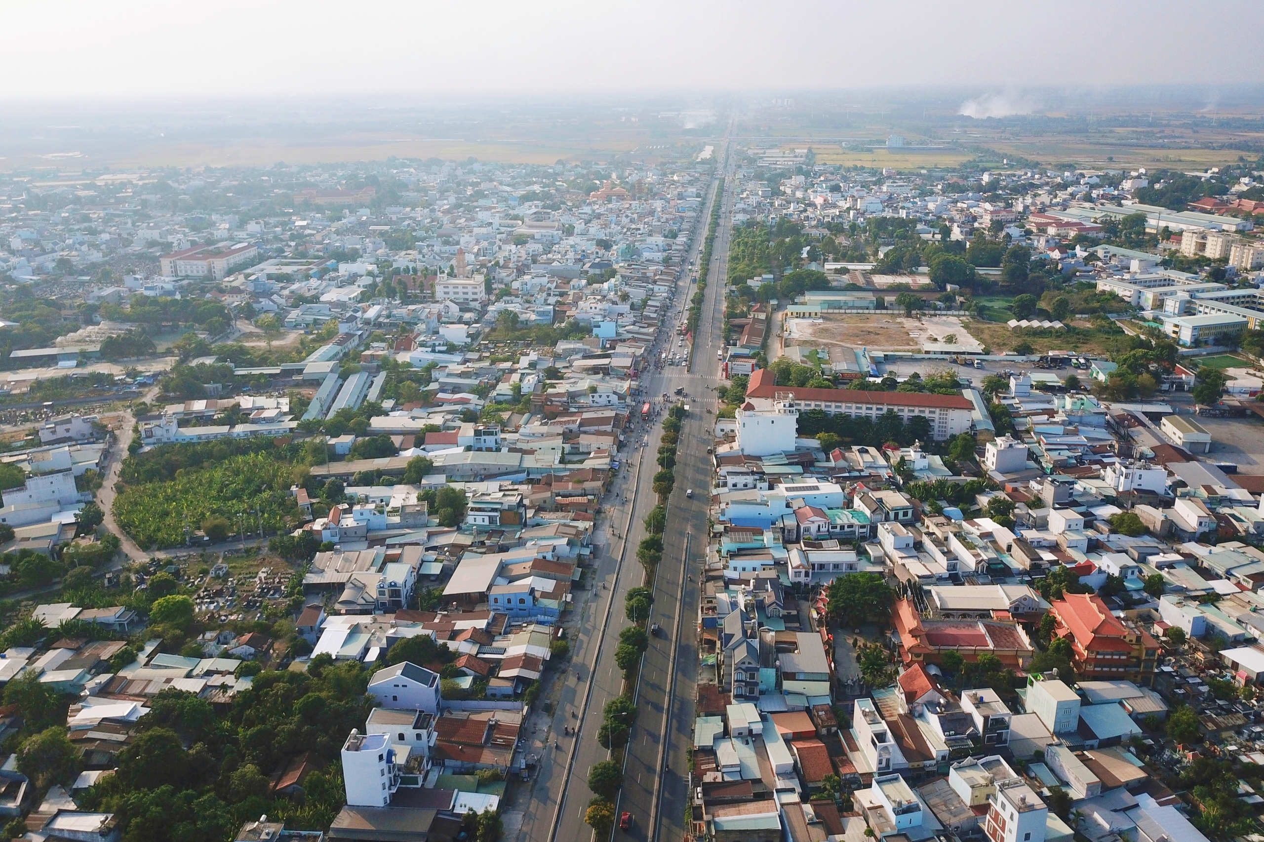 Giá đất ở được bồi thường cao nhất hơn 66,6 triệu đồng/m² ở dự án nâng cấp quốc lộ 22 TP.HCM - Ảnh 1.