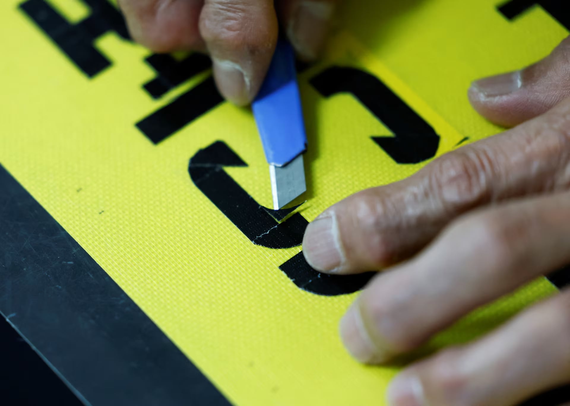 Gallery - Japanese security guard finds fame as designer of duct tape signs - image 1